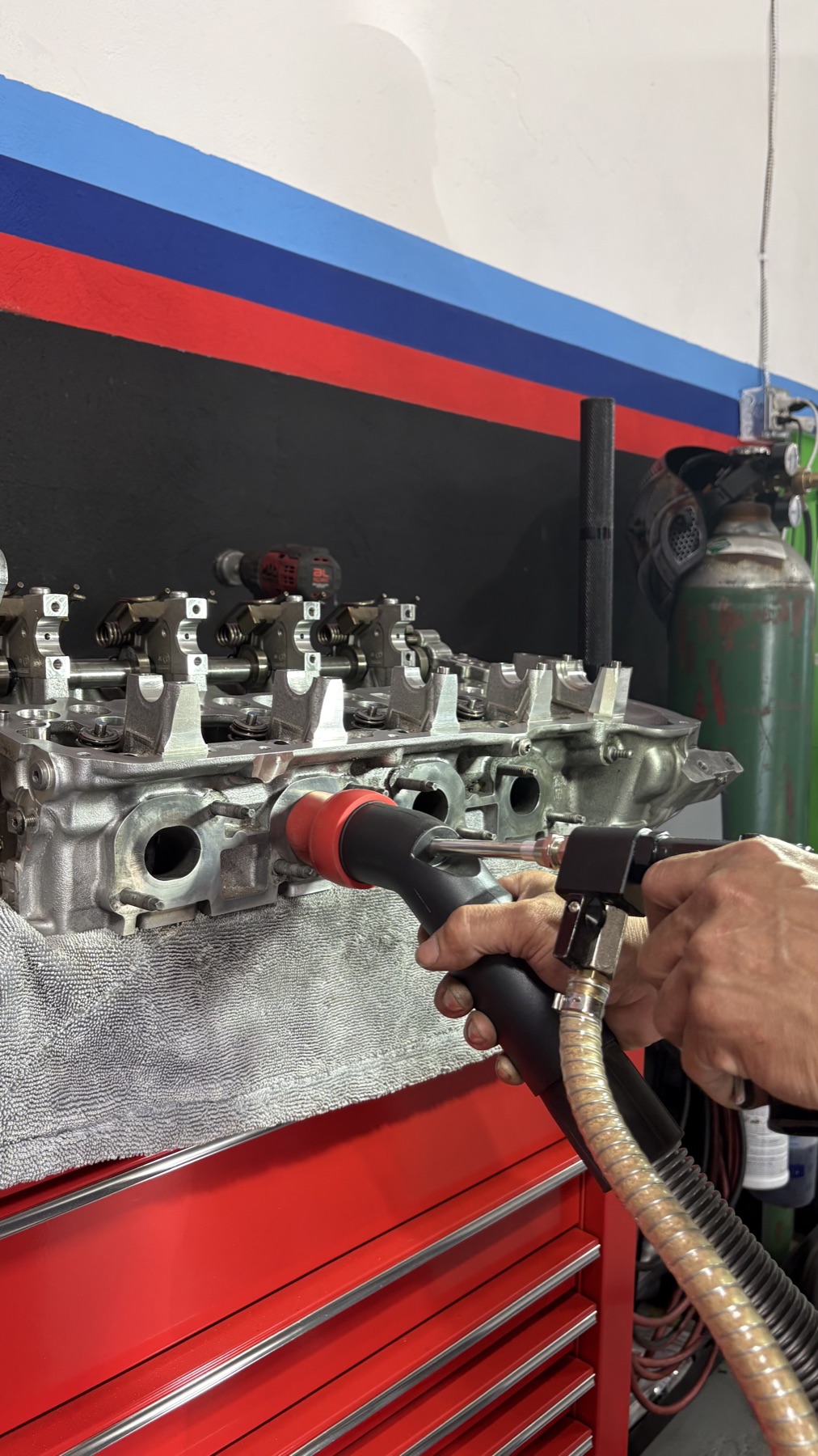 Precision cylinder-head cleaning in the Quazie Motor Sports workshop